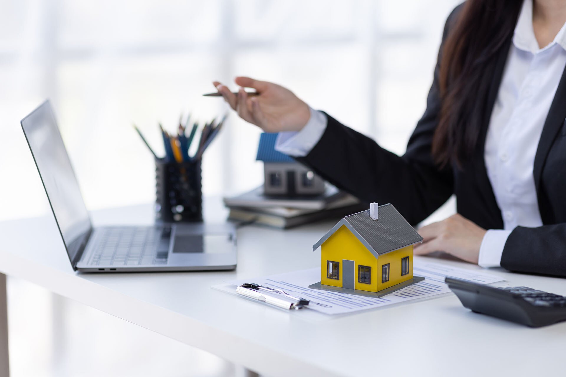real-estate-broker-agent-presenting-and-consult