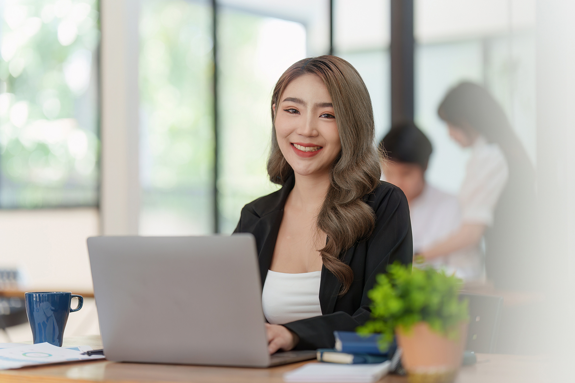 smiling-asian-accountant-person-analyze-financial-2023-06-29-19-52-08-utc